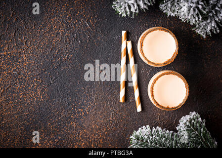 Traditional Christmas winter drink eggnog in glasses Stock Photo