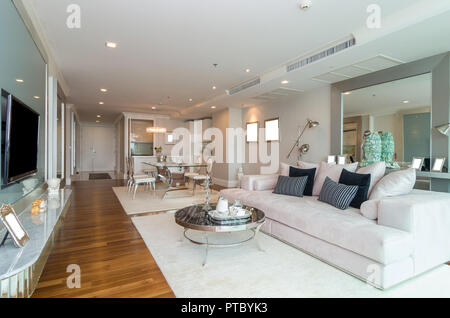 BANGKOK, THAILAND - APRIL 25 :  Luxury Interior living room with kitchen zone and restaurant set at My resort as river condominium beside the chao phr Stock Photo
