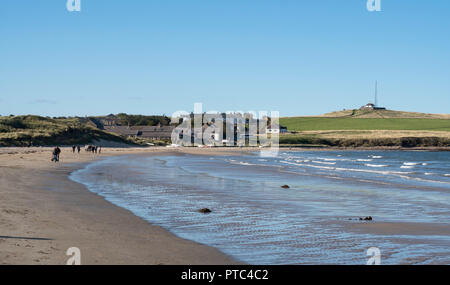 Looking north towards the village of Low Newton-By-The-Sea, Northumberland, England, UK Stock Photo