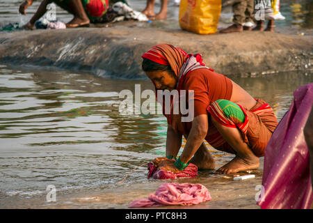 Traveler Hand Washing Clothes in Asia Stock Photo - Alamy