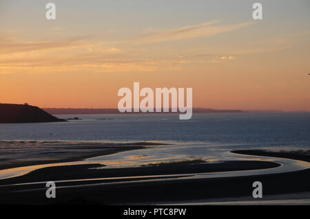 Sunset creates patterns on channels in the sand, Baie de St Brieuc, Brittany, France Stock Photo