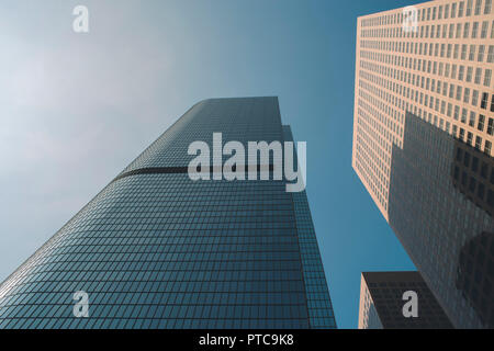 Low view of very tall sky scrapers in the daylight Stock Photo