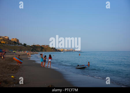 An evening on the beach at Coata del Sol, Fuengirola, Spain. Stock Photo