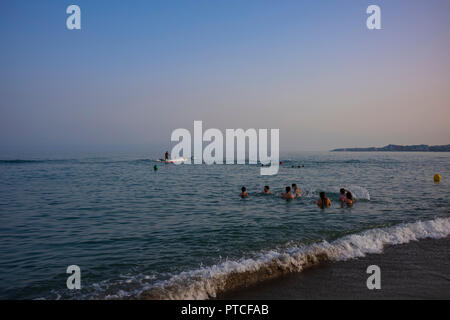 An evening on the beach at Coata del Sol, Fuengirola, Spain. Stock Photo