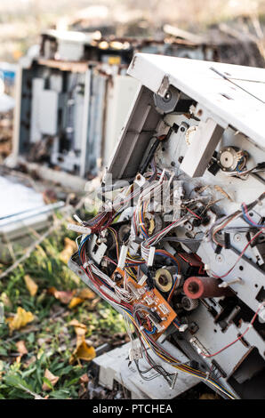 Old broken printers and copiers for scrap Stock Photo