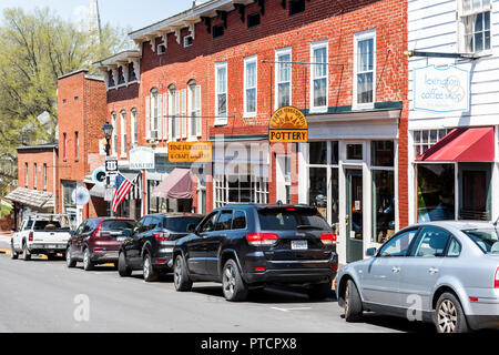 Lexington, USA - April 18, 2018: Historic downtown town city in Virginia countryside Shenandoah mountain village, signs for pottery, crafts stores sho Stock Photo