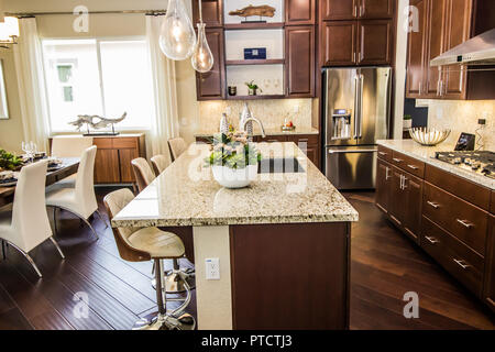 Modern Kitchen With Marble Island Counter Bar Stock Photo