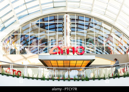 Tysons, USA - January 26, 2018: Closeup of AMC movie theater chain entrance sign in Tysons corner near McLean, Virginia inside, indoor, indoors of sho Stock Photo