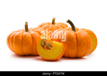 Fresh orange miniature pumpkin isolated Stock Photo