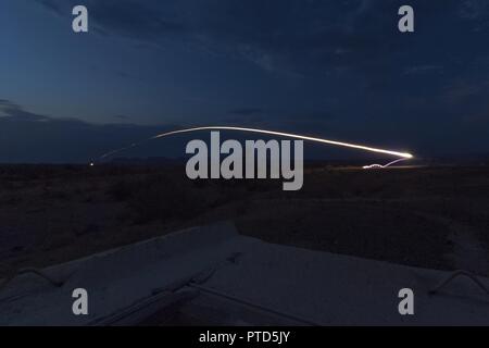 A U.S. Marine Corps Low Altitude Air Defense (LAAD) gunner with 3rd LAAD Battalion, Marine Air Control Group 38 (MACG-38), 3rd Marine Aircraft Wing (3D MAW) fires a FIM-92 Stinger surface-to-air missile during a live fire exercise at Yuma Proving Grounds, Yuma, Ariz., July 8, 2017. 3rd LAAD Battalion conducted the exercise in order to maintain proficiency and accuracy with the FIM-92 Stinger. Stock Photo