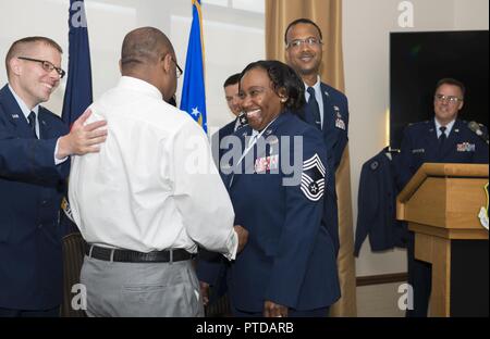 Former Senior Master Sgt. Francenia Reed-McKnight, is promoted to the rank of Chief Master Sgt. during an official ceremony, July 8, 2017, Niagara Falls Air Reserve Station, N.Y. Reed-McKnight is the first member of the Force Support Squadron to be promoted from within the squadron to the rank of Chief since its inception. Stock Photo