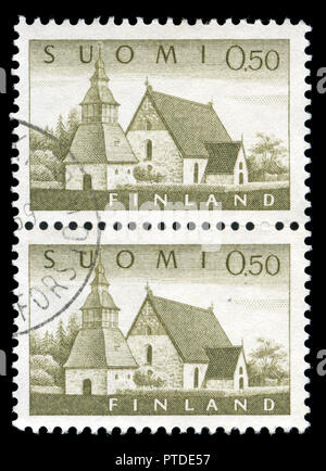 Postmarked stamps from Finland in the Lammi- Church series issued in 1963 Stock Photo