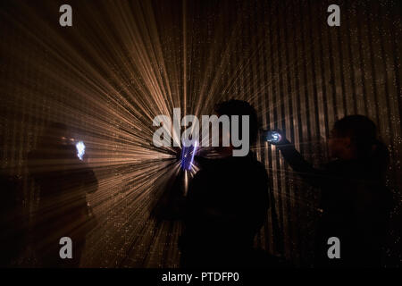 Light abstract projection. Colorful light rays. The silhouette of ...