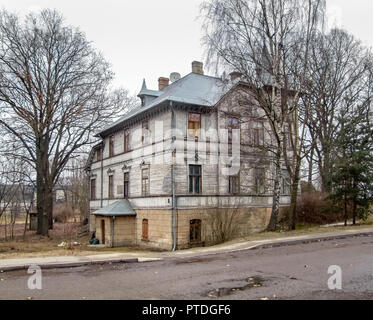 rundown wooden old house seen in Riga at winter time Stock Photo