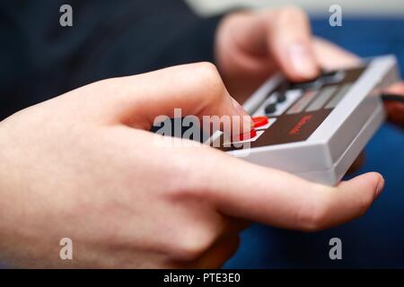 Nintengo NES,playing Super Mario 3 Stock Photo