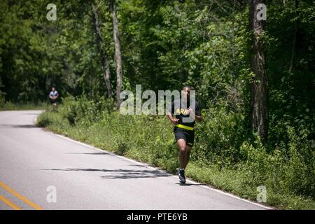 https://l450v.alamy.com/450v/pte6yb/us-army-staff-sgt-qujuan-baptiste-assigned-to-army-sustainment-command-runs-a-2-mile-route-during-the-army-physical-fitness-test-portion-of-the-2017-army-materiel-commands-best-warrior-competition-july-16-2017-at-camp-atterbury-indiana-during-the-three-day-competition-these-elite-warriors-are-test-on-basic-and-advanced-warrior-tasks-and-drills-pte6yb.jpg