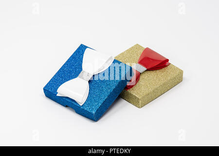 Two present boxes with bows stacked on each other. Stock Photo