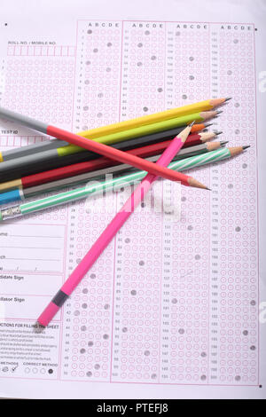 Picture of many colorful pencil on the OMR sheet. Stock Photo