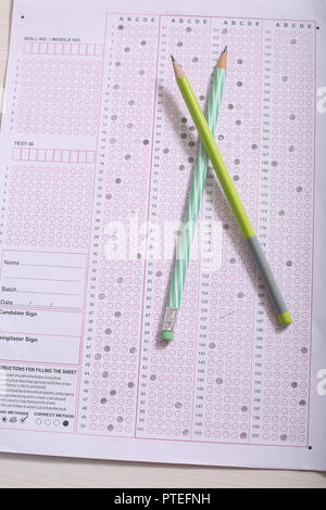 Picture of two  pencil on the OMR sheet. Stock Photo