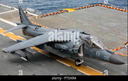 A U.S. Marine Corps AV-8B Harrier, assigned to Marine Attack Squadron (VMA)  231, taxis down the flight deck of the amphibious assault ship USS Wasp  (LHD 1) during flight certification operations, July