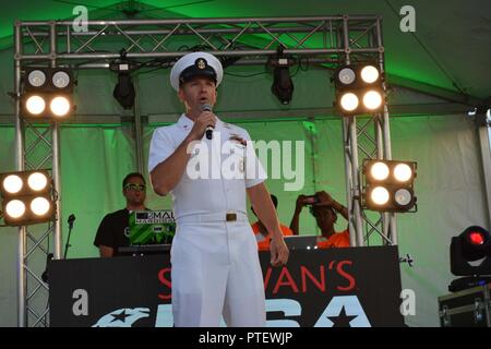 MINNEAPOLIS, MN (July 18, 2017) Navy Aircrew Rescue Swimmer Chief Petty Officer Aaron Albright sings the National Anthem during the opening ceremonies of the Schwans USA CUP. The USA CUP consist of teams from around the world competing for the championship. Chief Albrights signing of the anthem is just one event of the year’s Twin City’s Navy Week. Sponsored by the Navy Office of Community Outreach (NAVCO), Navy Weeks are a week-long schedule of community outreach engagements that connect Americans with their Navy by bringing Navy Sailors, equipment and displays to approximately 16 American ci Stock Photo