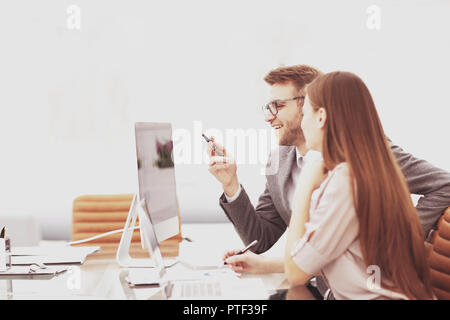 Two managers in a business meeting analyzing data Stock Photo