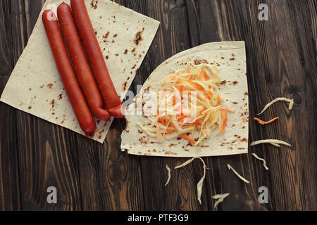 homemade sausage, pita bread and pickled cabbage for making Shaw Stock Photo