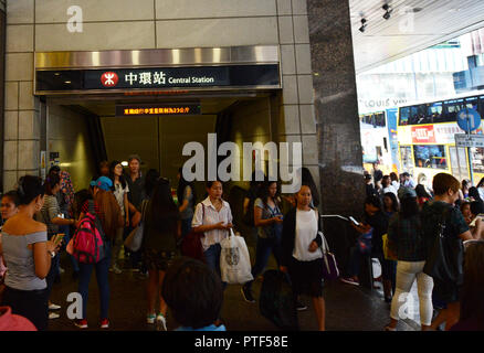 Filipino domestic helpers enjoying their Sunday ( day off ) in Hong Kong Central district. Stock Photo