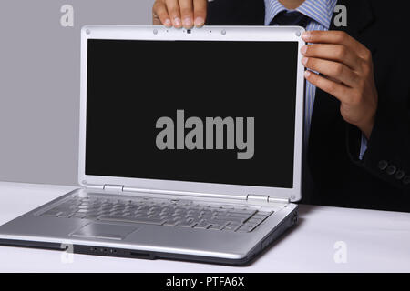closeup.businessman shows a stylish notebook Stock Photo
