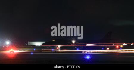 A U.S. Air Force B-1B Lancer assigned to the 9th Expeditionary Bomb Squadron, deployed from Dyess Air Force Base, Texas, sits on the flightline at Andersen Air Force Base, Guam, July 18, 2017. The B-1 conducted bilateral training mission with Australian Joint Terminal Attack Controllers (JTACs), July 18 as part of Talisman Saber 17, a training exercise designed to maximize combined training opportunities and conduct maritime preposition and logistics operations in the Pacific. Stock Photo