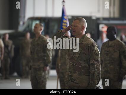 Lt. Col. Elton Sledge, the 455th Expeditionary Mission Support Group deputy commander, renders a salute during the 455th EMSG change of command ceremony at Bagram Airfield, Afghanistan, July 20, 2017. During the ceremony, Col. Bradford Coley relinquished command of the 455th EMSG to Col. Phillip Noltemeyer. Stock Photo