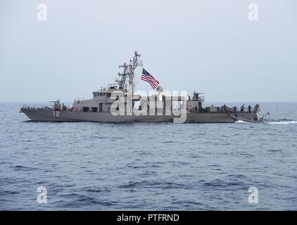 The coastal patrol ships USS Thunderbolt (PC 12) and USS Squall (PC 7 ...