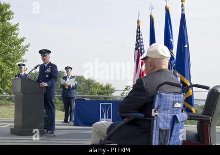 Maj. Gen. James A. Jacobson (standing at podium), Air Force District of Washington commander, delivers remarks at a Purple Heart award ceremony July 14, 2017 at the U.S. Air Force Memorial, Arlington, Va. The award was approved for World War II veteran Lt. Pedevillano (right) 72 years after he was liberated from a German prisoner of war camp by Gen. George S. Patton, Jr.’s 3rd U.S. Army. (Air Force Stock Photo