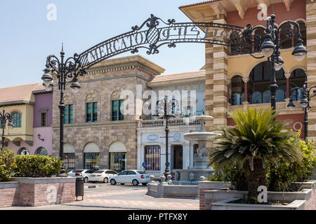 Entrance sign for the Mercato Mall in the Jumeirah 1 district of Dubai. The Italian-themed mall is home to more 140 shops, cafes and restaurants. Stock Photo