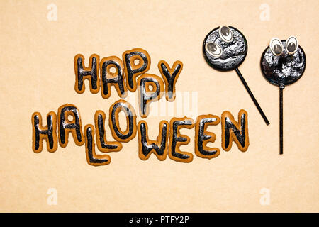 Halloween day background card with scary lollipops