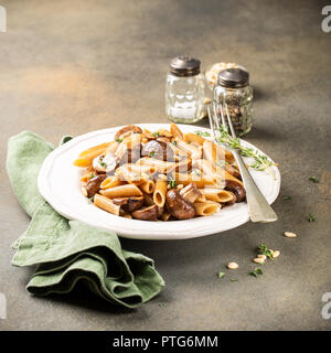 Homemade whole grain pasta penne Stock Photo