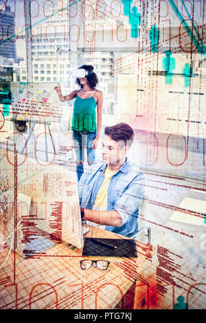 Composite image of binary codes and people icons Stock Photo