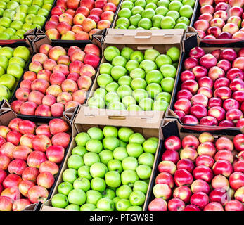 Background of fresh apples of new harvest ready to sale at the market Stock Photo