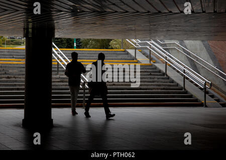 Motion blurred of walking in underpass