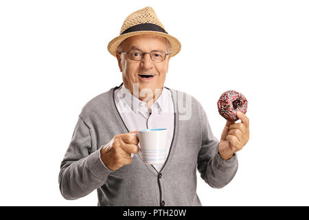 Mature man holding a cup and a donut isolated on white background Stock Photo