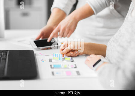 web designers creating mobile user interface Stock Photo