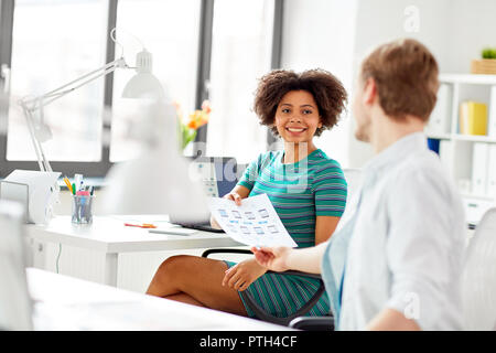 creative office workers with user interface mockup Stock Photo