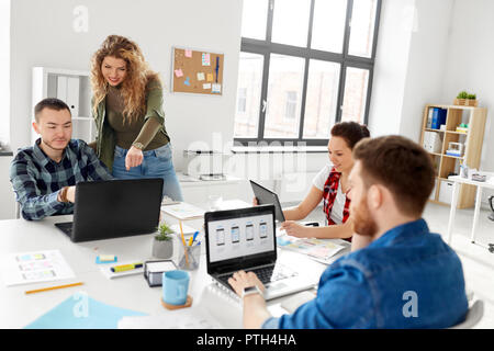 creative team working on user interface at office Stock Photo