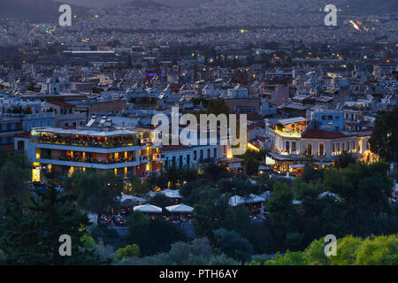 Athens, Greece - October 07, 2017: View of Thissio quarters in Athens from Areopagus hill at sunset, Greece. Stock Photo
