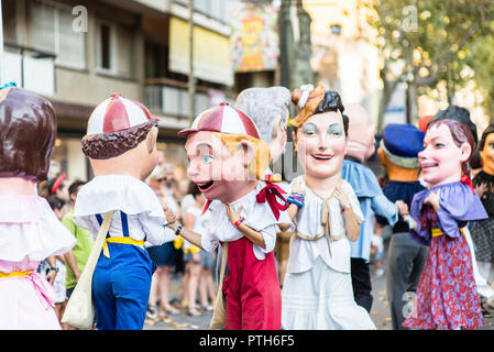 Dwarf  dancing and playing together on the Rambla during the  the Festa Major. Vilanova i la Geltru' . Summer 2018 Stock Photo