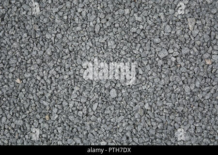 Grey small gravel textured road background, small stone backdrop Stock Photo