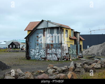 Spooky Yellow Condemned Home Building ready for Demolition at Harbor area in Reykjavik Stock Photo