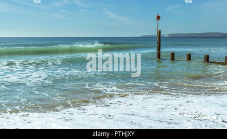 The waves wash over the Groynes at Boscombe in Bournemouth, UK. Taken on 7th October 2018. Stock Photo