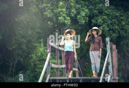 girl standing by the bridge Stock Photo