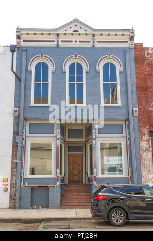 JOHNSON CITY, TN, USA-9/30/18: An old blue front empty building in downtown. Stock Photo